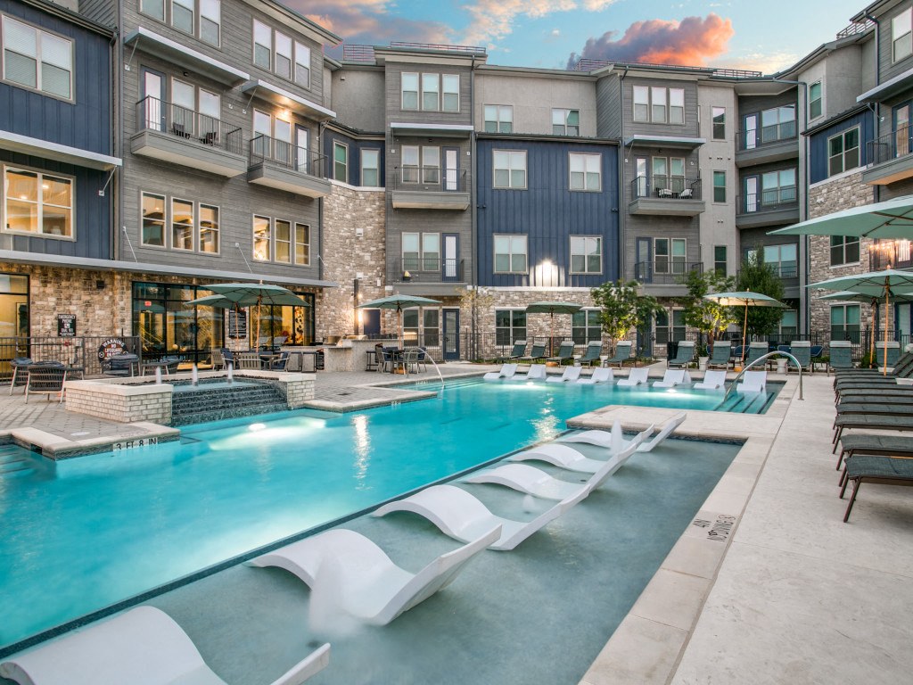 Resort-style pool with tanning ledge